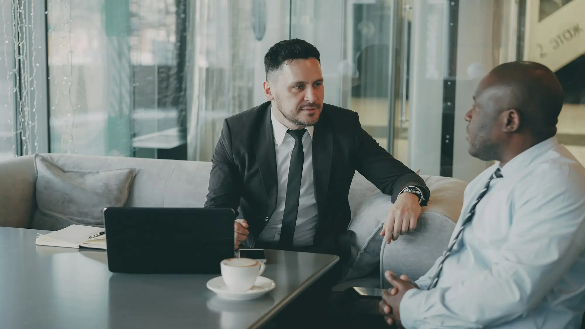 Accountant meeting a client in a modern office